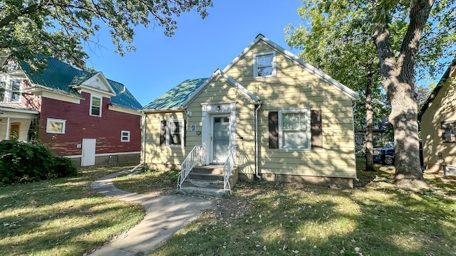 view of front of home with a front lawn