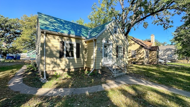 exterior space with a front yard