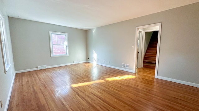 empty room with light wood-type flooring