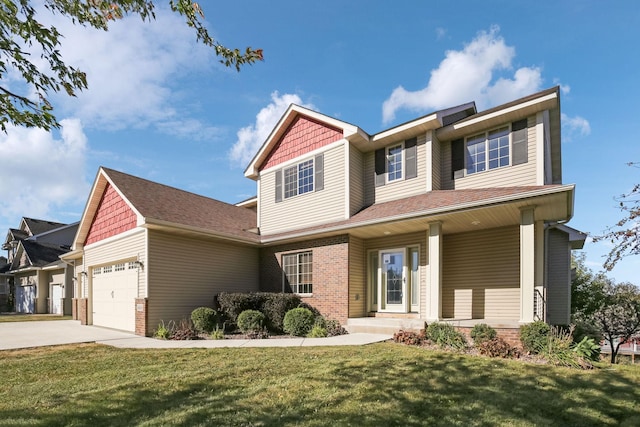 view of front of property with a front yard, a garage, and covered porch