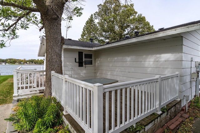 view of side of property with a water view