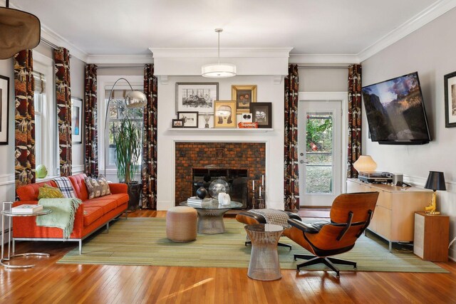 1920 Pillsbury Ave S, Minneapolis, MN 55403 - living area featuring hardwood / wood-style flooring, ornamental molding, and a fireplace