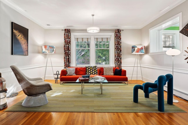 1920 Pillsbury Ave S, Minneapolis, MN 55403 - living room with ornamental molding, wood finished floors, and a wainscoted wall