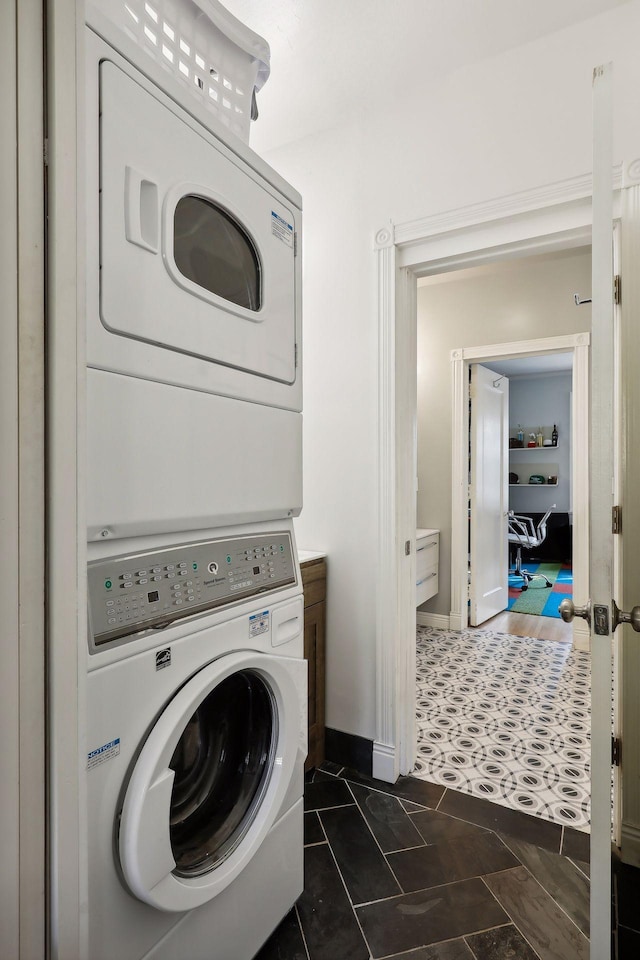 1920 Pillsbury Ave S, Minneapolis, MN 55403 - laundry area with estacked washer and dryer and baseboards