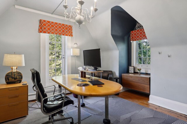 1920 Pillsbury Ave S, Minneapolis, MN 55403 - office area featuring wood finished floors, a chandelier, lofted ceiling, baseboards, and a baseboard heating unit