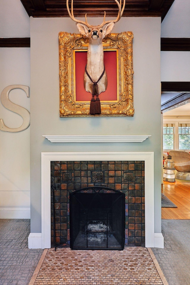 1920 Pillsbury Ave S, Minneapolis, MN 55403 - detailed view of a fireplace with flush hearth, ornamental molding, carpet, and baseboards