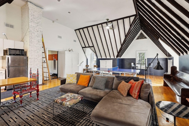 1920 Pillsbury Ave S, Minneapolis, MN 55403 - living room with high vaulted ceiling and wood finished floors