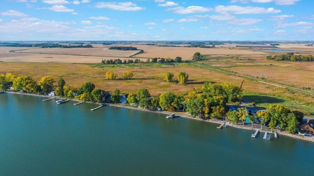 drone / aerial view with a rural view and a water view