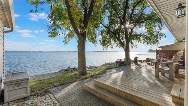 8737 123rd Ave SE, Lake Lillian, MN 56253 - wooden terrace with a water view