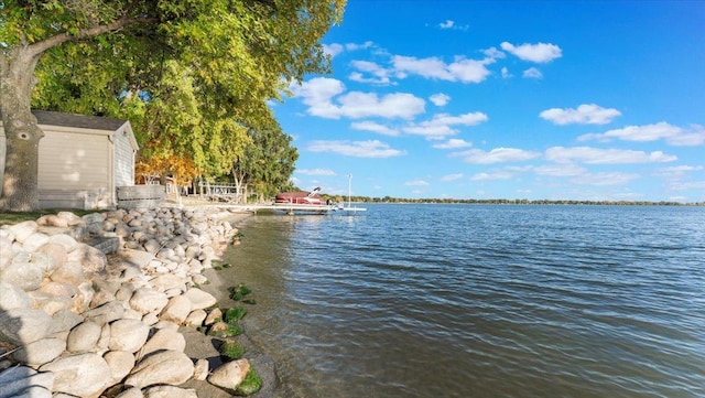 8737 123rd Ave SE, Lake Lillian, MN 56253 - water view featuring a boat dock