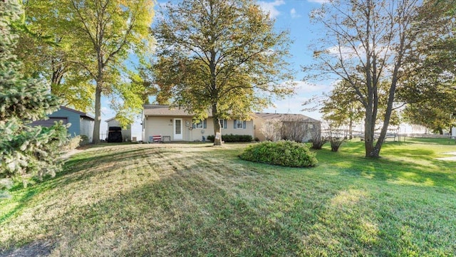 8737 123rd Ave SE, Lake Lillian, MN 56253 - view of front of house featuring a front yard