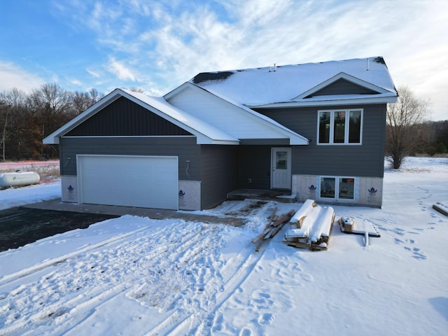 view of front of property with a garage