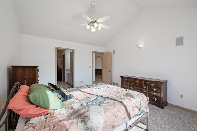 bedroom with ensuite bathroom, light colored carpet, ceiling fan, and high vaulted ceiling