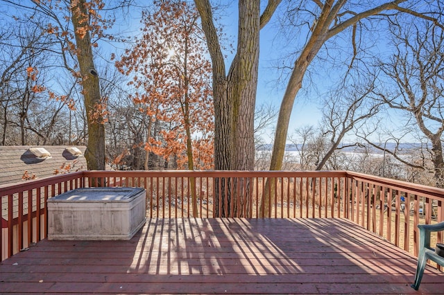 deck featuring a hot tub