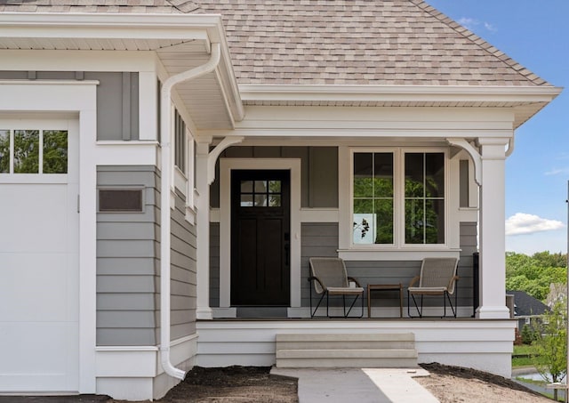 entrance to property featuring a porch