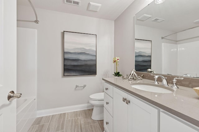 full bathroom with visible vents, baseboards, toilet, and vanity