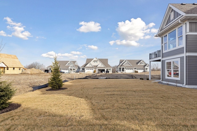 view of yard featuring a residential view