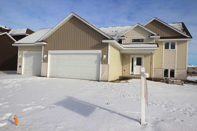 view of front of property with a garage