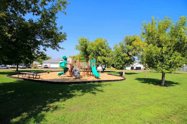 view of jungle gym with a lawn