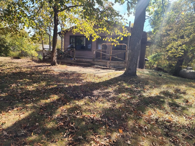 view of yard featuring a deck