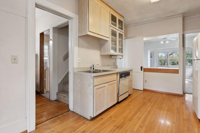 kitchen with light hardwood / wood-style floors, ceiling fan, light brown cabinetry, sink, and stainless steel dishwasher