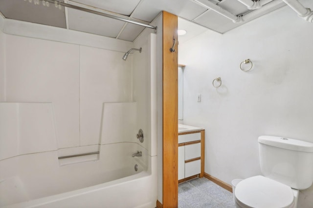 bathroom featuring tub / shower combination and toilet