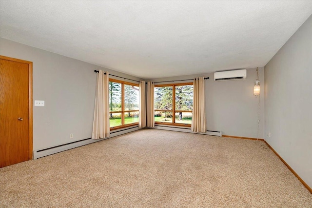 unfurnished room featuring carpet, a wall mounted AC, and a textured ceiling