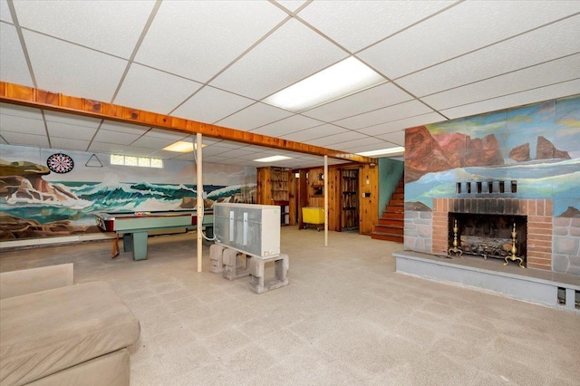 playroom featuring a fireplace, carpet flooring, billiards, and a drop ceiling