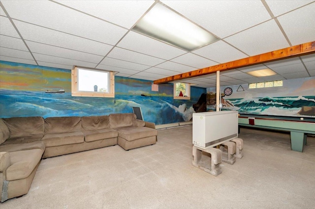 carpeted bedroom with a paneled ceiling