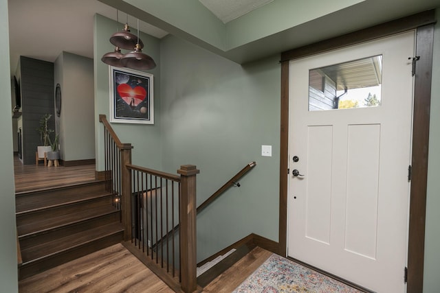 foyer with hardwood / wood-style flooring