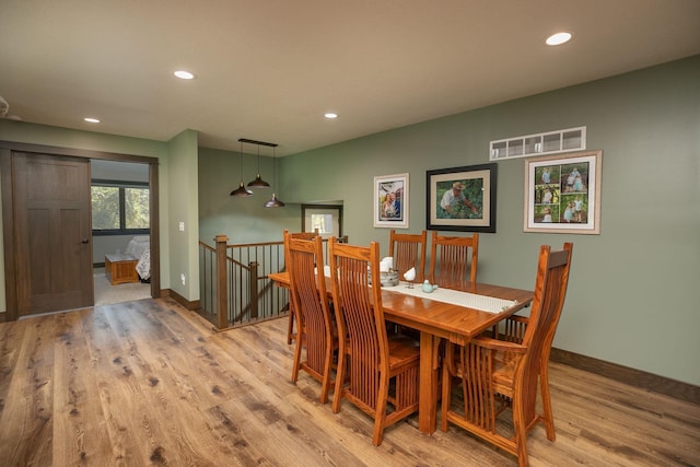 dining room featuring light hardwood / wood-style flooring