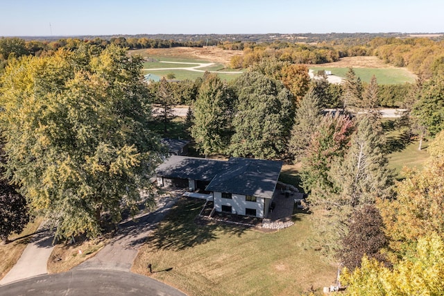 birds eye view of property with a rural view