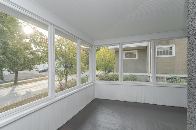 unfurnished sunroom featuring a wealth of natural light