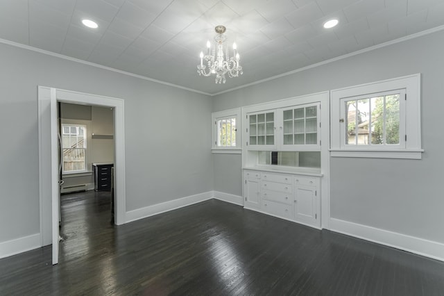 unfurnished room featuring plenty of natural light and ornamental molding