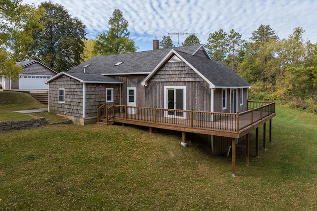 back of property featuring a deck and a lawn