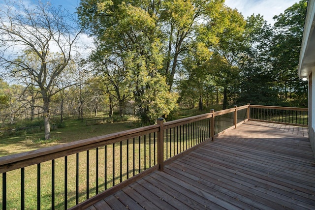 deck featuring a lawn