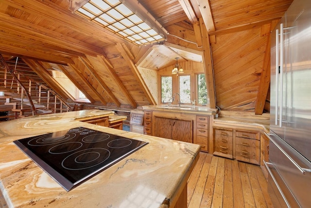 kitchen with wood ceiling, high end refrigerator, and wood counters