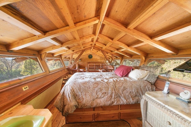 bedroom with beamed ceiling, wooden ceiling, hardwood / wood-style flooring, and wooden walls