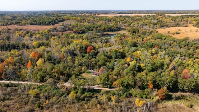 bird's eye view featuring a forest view