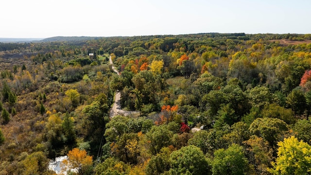 aerial view featuring a view of trees