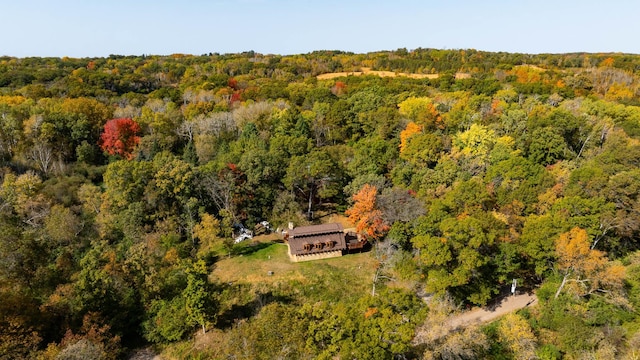 bird's eye view featuring a forest view