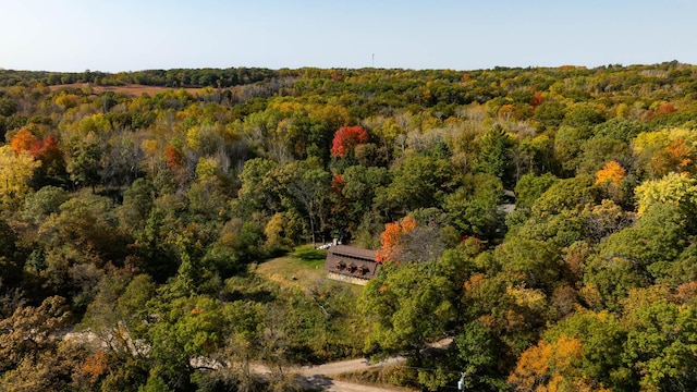 aerial view featuring a view of trees