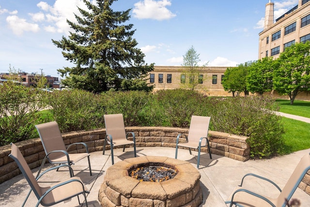 view of patio / terrace featuring a fire pit