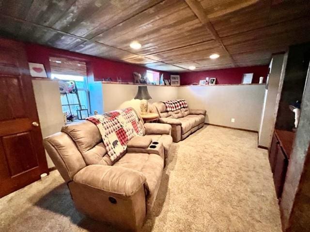 home theater room featuring light carpet