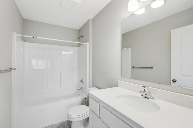 full bathroom featuring vanity, toilet, and washtub / shower combination