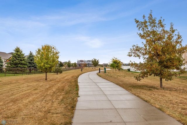 view of home's community featuring a lawn