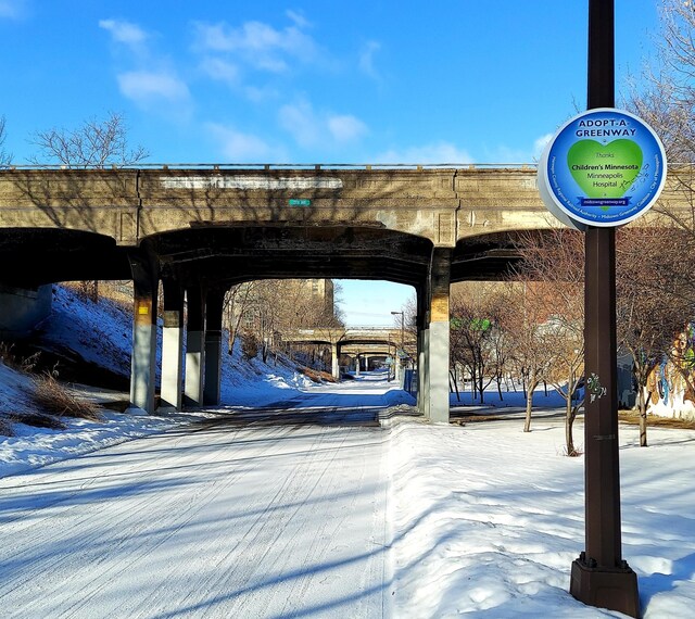 view of snow covered parking