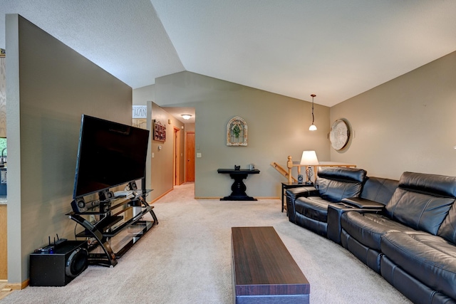 living room with lofted ceiling and carpet floors