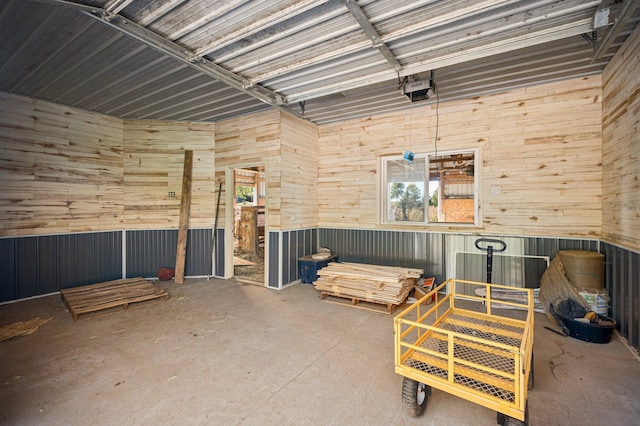 garage with wood walls