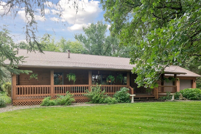 exterior space with a front lawn and a porch